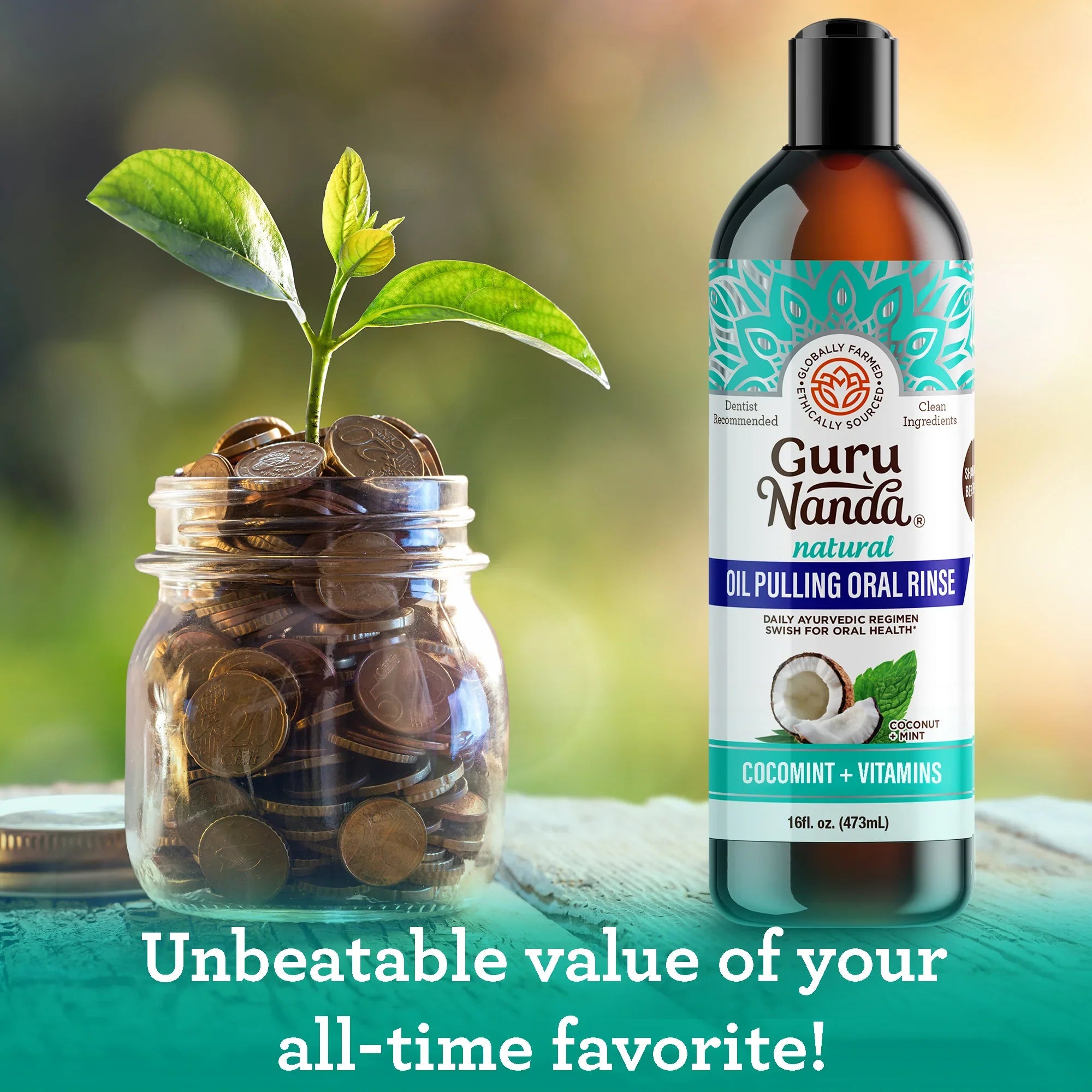 Guru Nanda oil pulling oral rinse bottle with a jar of coins and a plant, on a blurred natural background.
