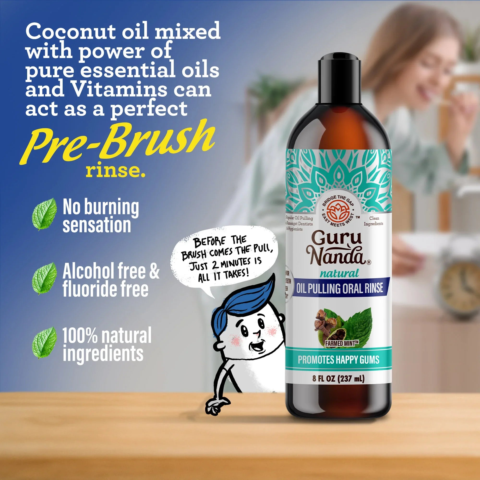 Guru Nanda oil pulling oral rinse bottle with promotional text on a blurred background