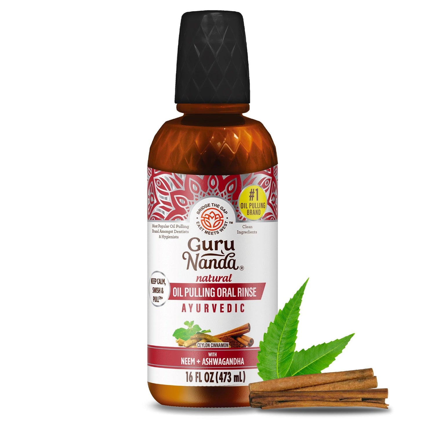 Bottle of Guru Nanda Ayurvedic oil pulling product with leaves and cinnamon sticks on a white background 
